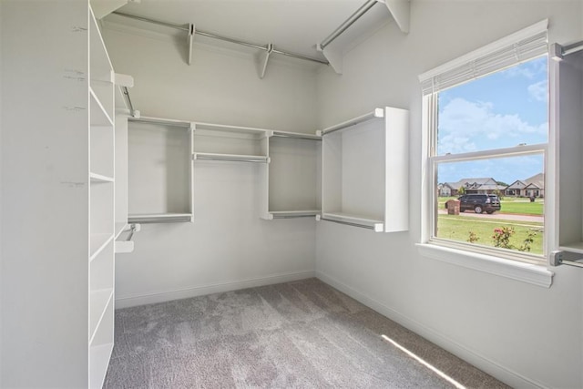 12825 SW 26th St, Yukon, OK 73099 - spacious closet featuring carpet flooring