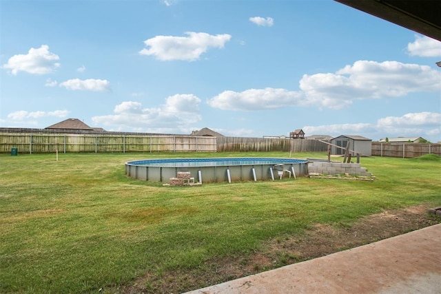 12825 SW 26th St, Yukon, OK 73099 - fenced backyard featuring a shed