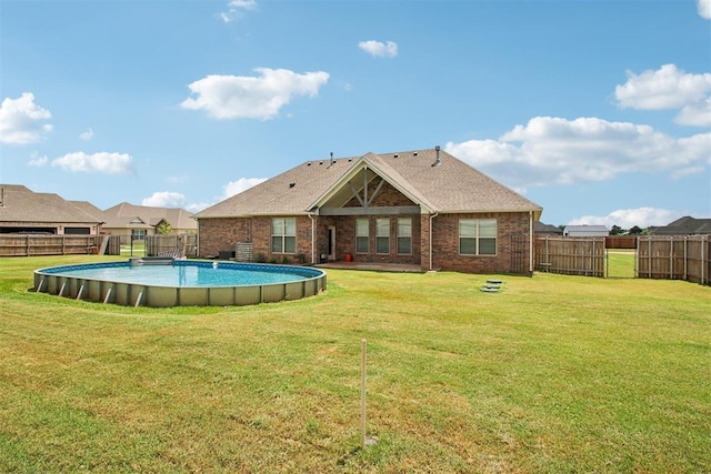 12825 SW 26th St, Yukon, OK 73099 - view of pool with a fenced backyard