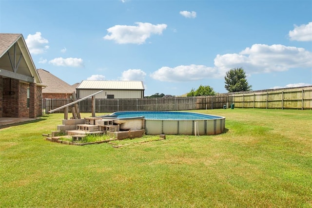 12825 SW 26th St, Yukon, OK 73099 - view of pool featuring a fenced backyard