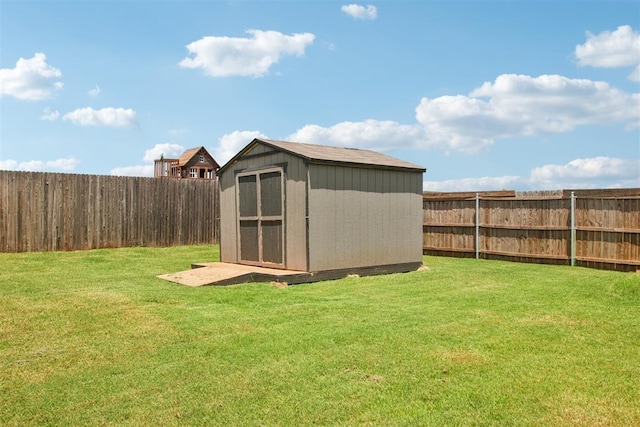 12825 SW 26th St, Yukon, OK 73099 - view of shed with a fenced backyard