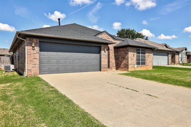 2401 Westchester Dr, Moore, OK 73160 - ranch-style house featuring a garage, driveway, brick siding, and roof with shingles