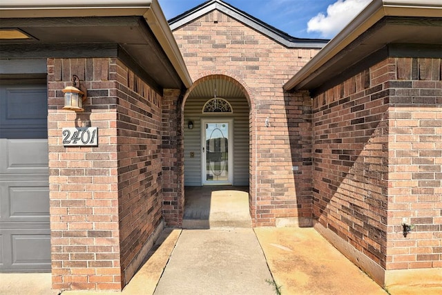 2401 Westchester Dr, Moore, OK 73160 - property entrance with brick siding and a garage