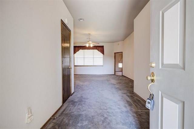 2401 Westchester Dr, Moore, OK 73160 - carpeted foyer with a ceiling fan