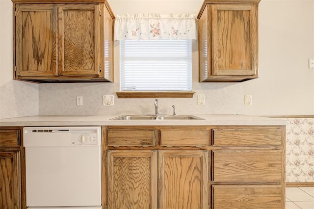 2401 Westchester Dr, Moore, OK 73160 - kitchen featuring dishwasher, light countertops, and light tile patterned floors