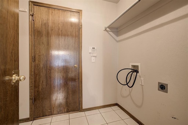 2401 Westchester Dr, Moore, OK 73160 - washroom featuring washer hookup, hookup for an electric dryer, and light tile patterned floors