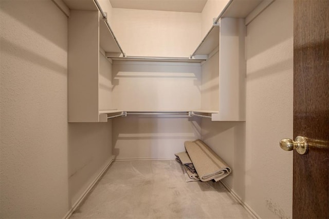 2401 Westchester Dr, Moore, OK 73160 - walk in closet with light carpet