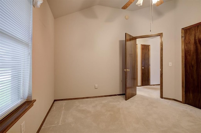 2401 Westchester Dr, Moore, OK 73160 - unfurnished bedroom featuring lofted ceiling, light colored carpet, and ceiling fan