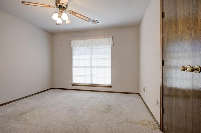 2401 Westchester Dr, Moore, OK 73160 - carpeted empty room with a ceiling fan and baseboards