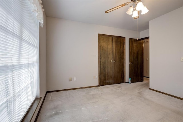 2401 Westchester Dr, Moore, OK 73160 - unfurnished bedroom featuring carpet floors, a closet, and ceiling fan