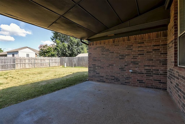 2401 Westchester Dr, Moore, OK 73160 - fenced backyard with a patio area