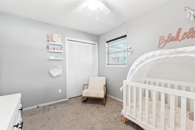 815 W 7th St, Edmond, OK 73003 - carpeted bedroom featuring a closet, a ceiling fan, and a nursery area