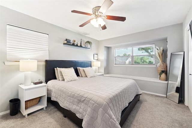815 W 7th St, Edmond, OK 73003 - carpeted bedroom with baseboards and ceiling fan