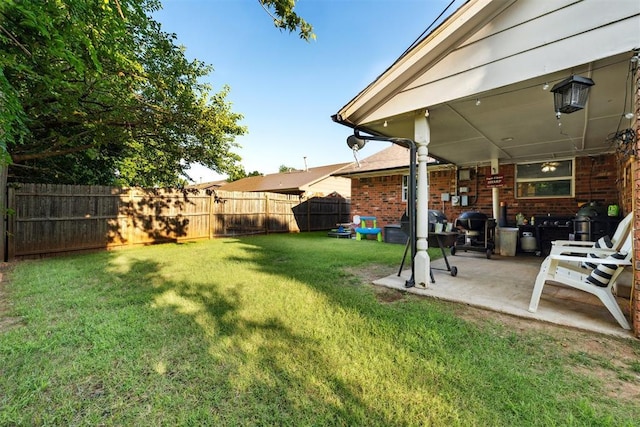 815 W 7th St, Edmond, OK 73003 - fenced backyard with a patio area