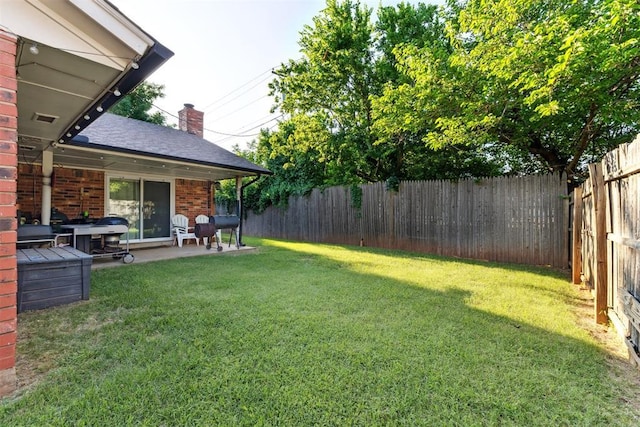 815 W 7th St, Edmond, OK 73003 - fenced backyard featuring a patio area