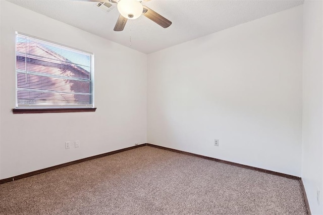 515 Cripple Creek Dr, Norman, OK 73071 - carpeted empty room featuring ceiling fan and baseboards