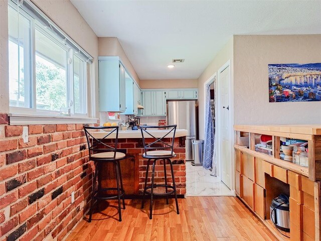 2901 Maple Ln, Edmond, OK 73034 - dining room with light wood-type flooring