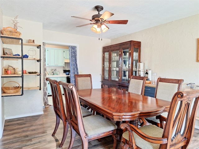 2901 Maple Ln, Edmond, OK 73034 - dining area with ceiling fan and wood finished floors