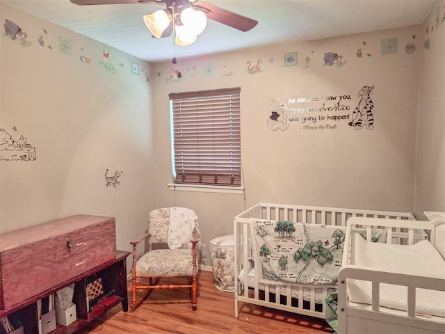 2901 Maple Ln, Edmond, OK 73034 - bedroom with wood finished floors and ceiling fan