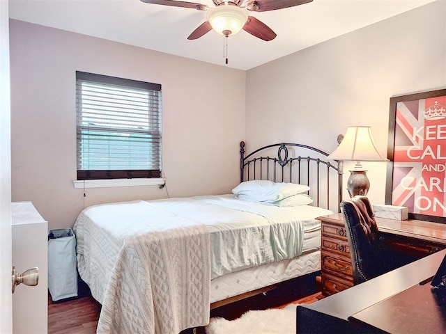 2901 Maple Ln, Edmond, OK 73034 - bedroom with wood finished floors and a ceiling fan