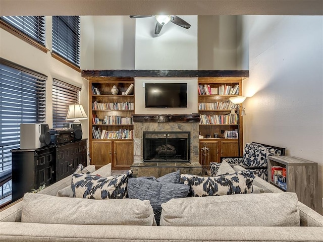 6500 N Grand Blvd Unit 131, Oklahoma City, OK 73116 - living area featuring a ceiling fan, a high end fireplace, and built in shelves