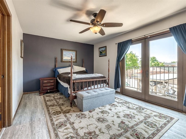6500 N Grand Blvd Unit 131, Oklahoma City, OK 73116 - bedroom featuring french doors, access to outside, wood finished floors, and a ceiling fan