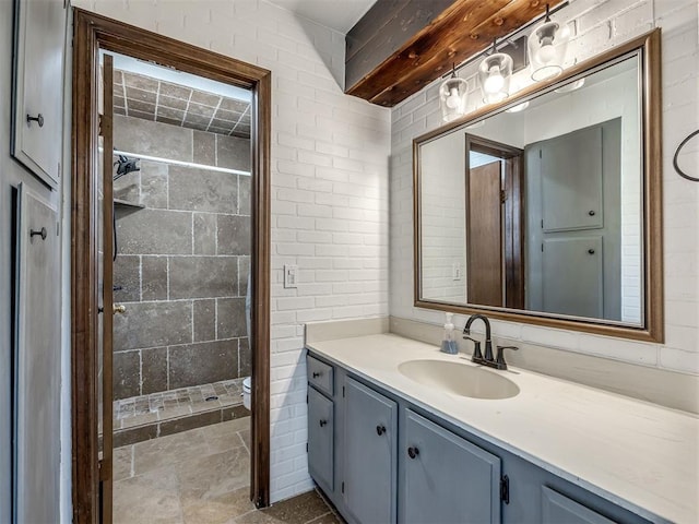 6500 N Grand Blvd Unit 131, Oklahoma City, OK 73116 - bathroom featuring vanity, a stall shower, and stone finish flooring