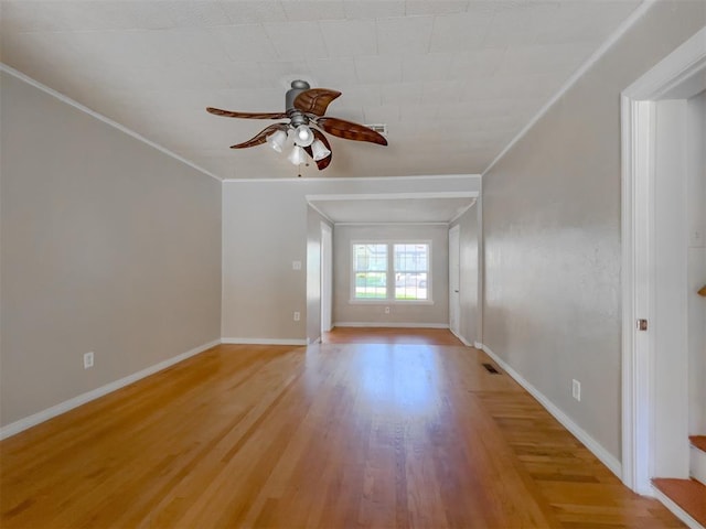 2437 NW 36th Ter, Oklahoma City, OK 73112 - unfurnished room featuring a ceiling fan, light wood finished floors, and crown molding