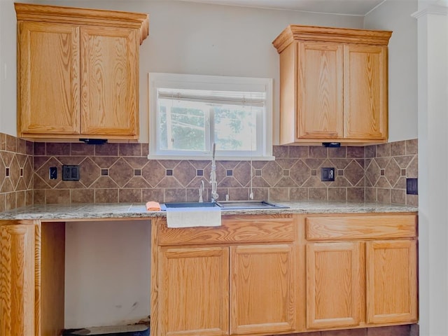 2437 NW 36th Ter, Oklahoma City, OK 73112 - kitchen with tasteful backsplash and light stone counters