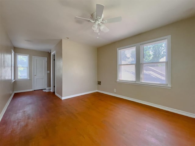 2437 NW 36th Ter, Oklahoma City, OK 73112 - spare room featuring wood finished floors and ceiling fan