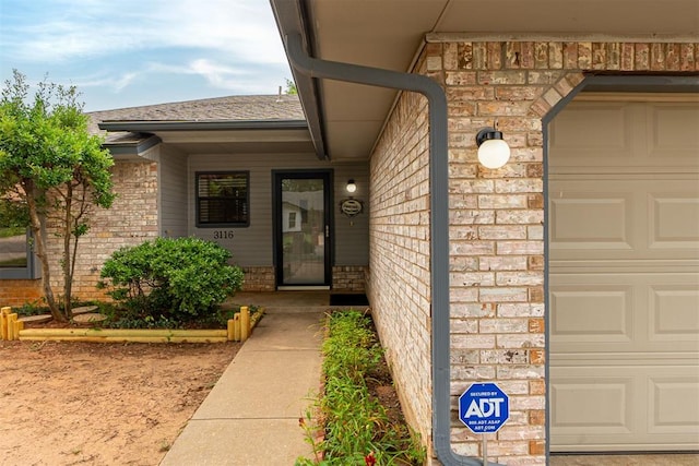 3116 SW 96th St, Oklahoma City, OK 73159 - doorway to property with brick siding