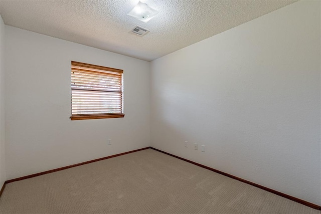 3116 SW 96th St, Oklahoma City, OK 73159 - carpeted empty room featuring baseboards and a textured ceiling
