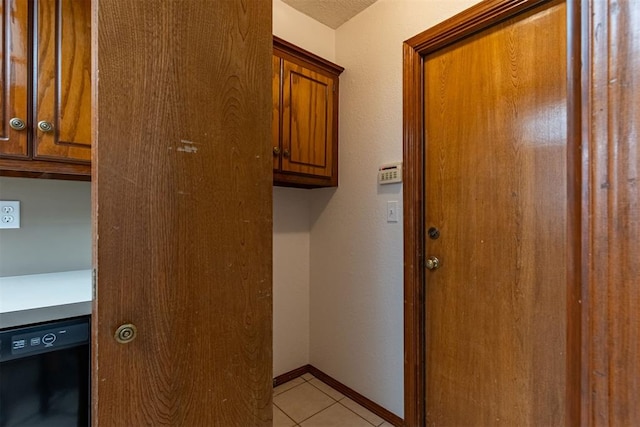 3116 SW 96th St, Oklahoma City, OK 73159 - laundry room featuring light tile patterned flooring and baseboards