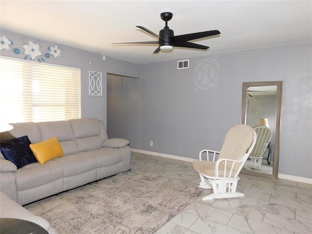 2236 Highland Rd, Oklahoma City, OK 73110 - living area featuring ceiling fan and marble look tiles