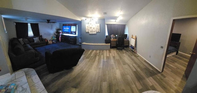 2236 Highland Rd, Oklahoma City, OK 73110 - living area featuring lofted ceiling, wood finished floors, ceiling fan, a chandelier, and an office area