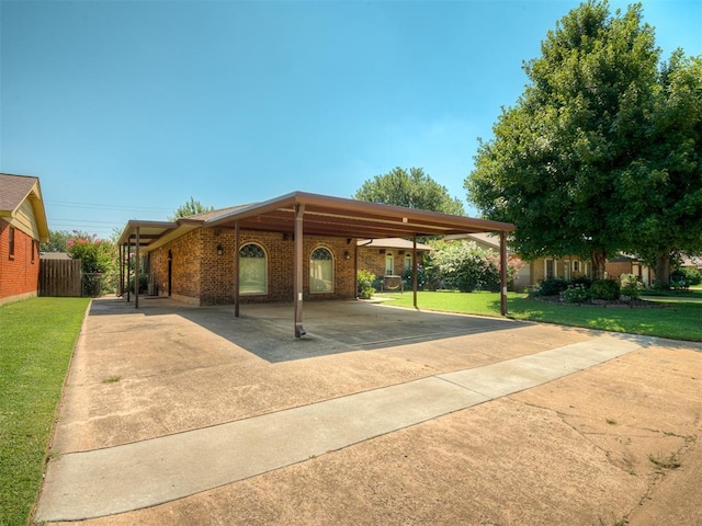 924 Penn Ln, Moore, OK 73160 - view of property's community featuring driveway and a carport