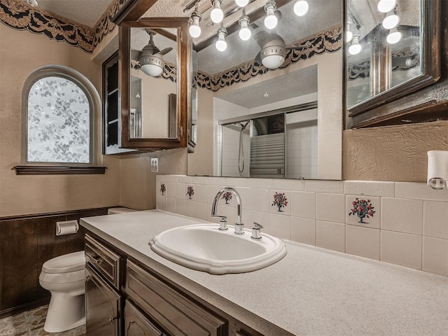 924 Penn Ln, Moore, OK 73160 - bathroom with vanity and tasteful backsplash