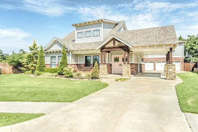 833 Gathering Leaves Way Unit 9183810100, Edmond, OK 73034 - craftsman house with concrete driveway, a shingled roof, brick siding, and covered porch