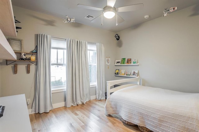 833 Gathering Leaves Way Unit 9183810100, Edmond, OK 73034 - bedroom featuring light wood-style floors and a ceiling fan