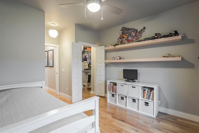 833 Gathering Leaves Way Unit 9183810100, Edmond, OK 73034 - bedroom featuring light wood-type flooring and ceiling fan
