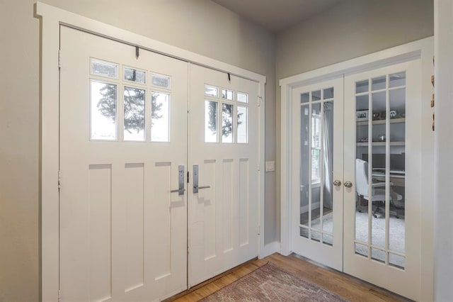 833 Gathering Leaves Way Unit 9183810100, Edmond, OK 73034 - foyer entrance featuring french doors and wood finished floors