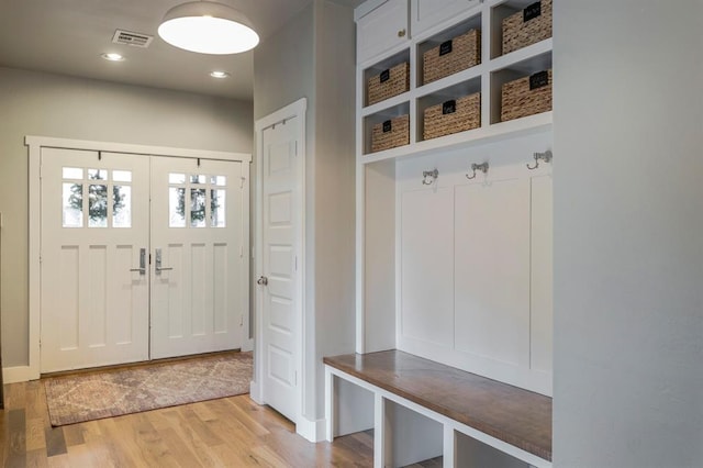 833 Gathering Leaves Way Unit 9183810100, Edmond, OK 73034 - mudroom featuring light wood-style floors and recessed lighting