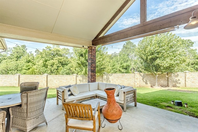 833 Gathering Leaves Way Unit 9183810100, Edmond, OK 73034 - fenced backyard with a patio, an outdoor hangout area, and view of scattered trees