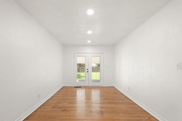 2525 NW 32nd St, Oklahoma City, OK 73112 - unfurnished room with wood finished floors, recessed lighting, and french doors