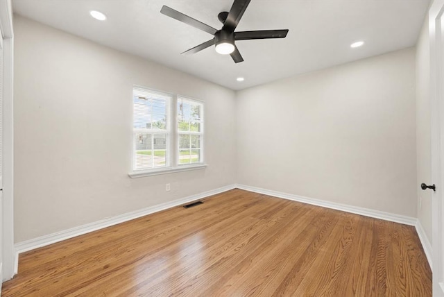2525 NW 32nd St, Oklahoma City, OK 73112 - spare room featuring light wood-style floors, a ceiling fan, and recessed lighting