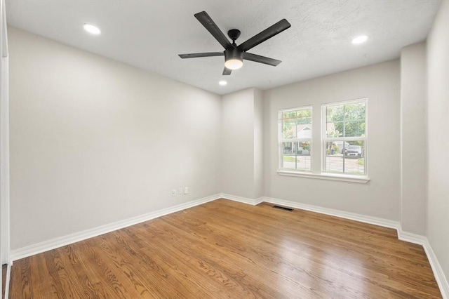 2525 NW 32nd St, Oklahoma City, OK 73112 - unfurnished room with ceiling fan, light wood finished floors, and recessed lighting