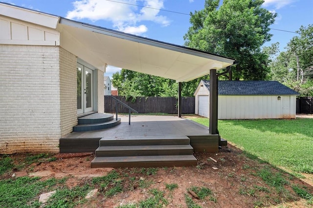 2525 NW 32nd St, Oklahoma City, OK 73112 - deck with french doors and an outbuilding