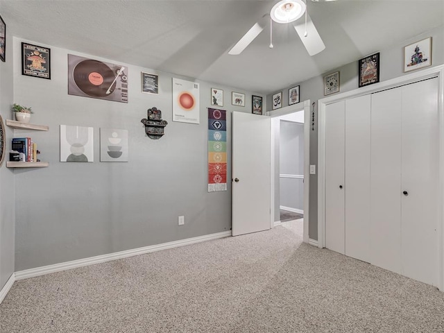 5101 Long Branch Ln, Edmond, OK 73034 - unfurnished bedroom featuring carpet flooring, a closet, and a ceiling fan