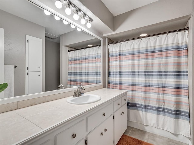 5101 Long Branch Ln, Edmond, OK 73034 - bathroom with vanity, tile patterned floors, and curtained shower