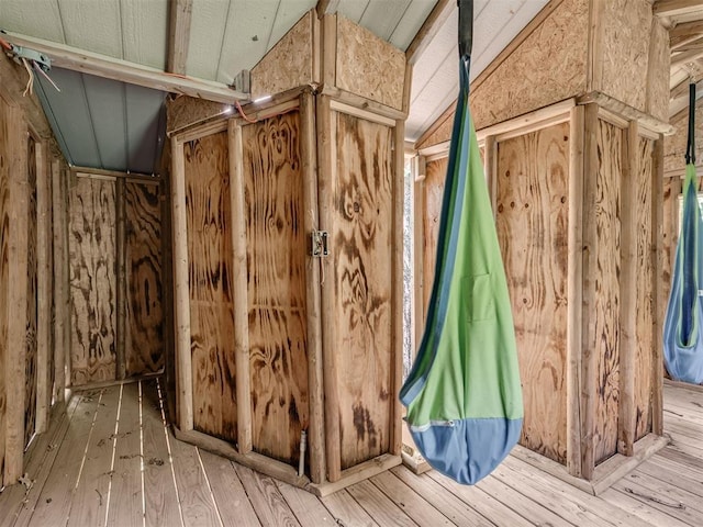 5101 Long Branch Ln, Edmond, OK 73034 - miscellaneous room with hardwood / wood-style floors and vaulted ceiling